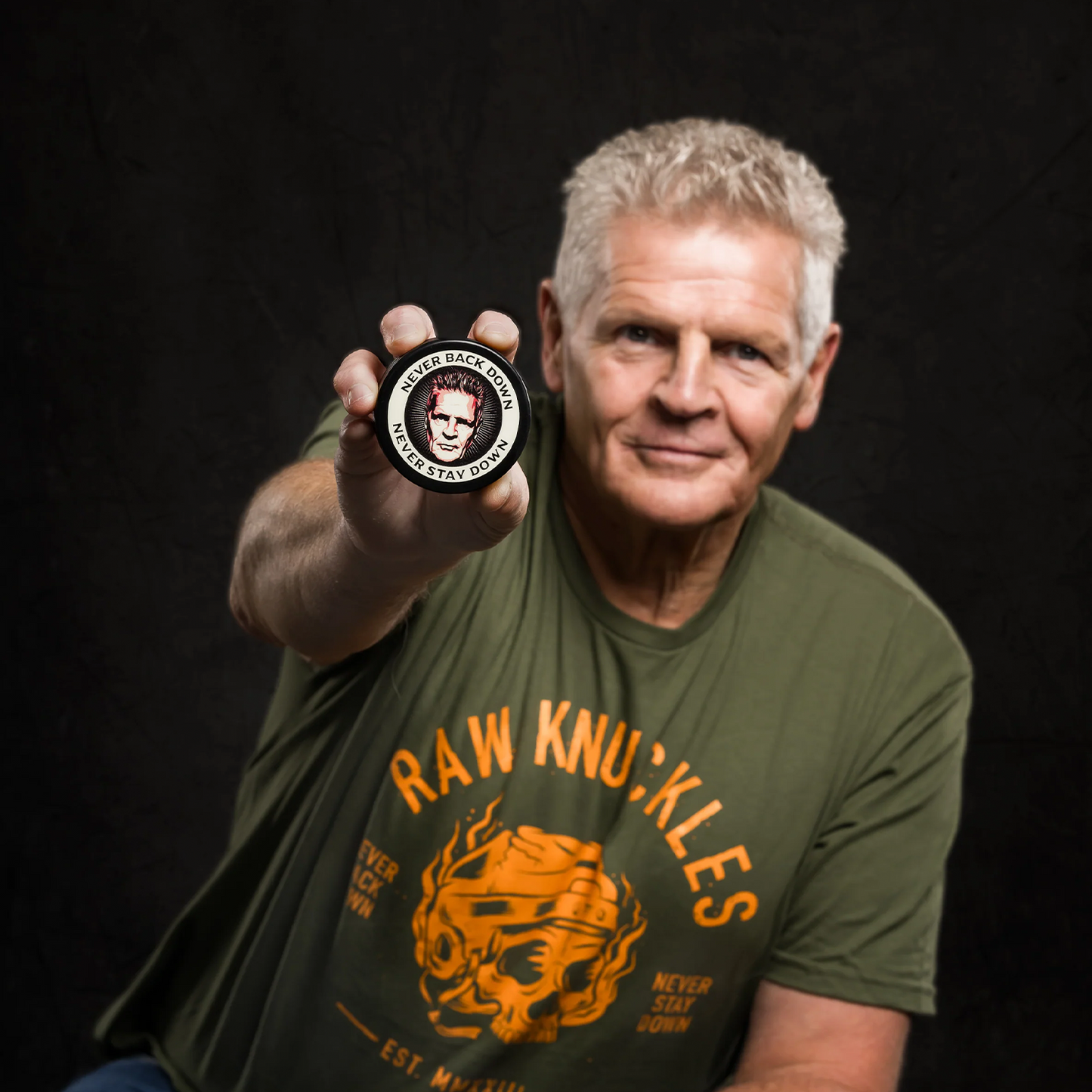 Never Stay Down Hockey Puck